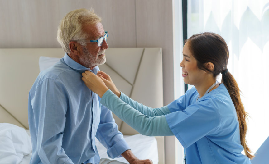 caregiver assisting senior