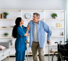 caregiver assisting senior