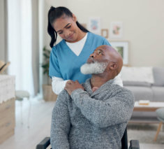 caregiver checking senior man