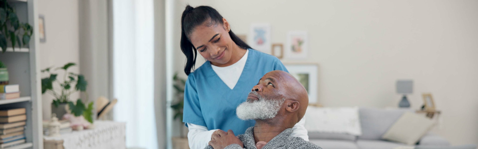 caregiver checking senior man